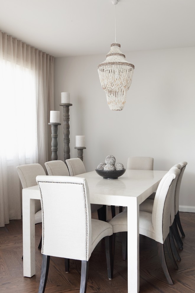 This is an example of a contemporary dining room in Sunshine Coast.