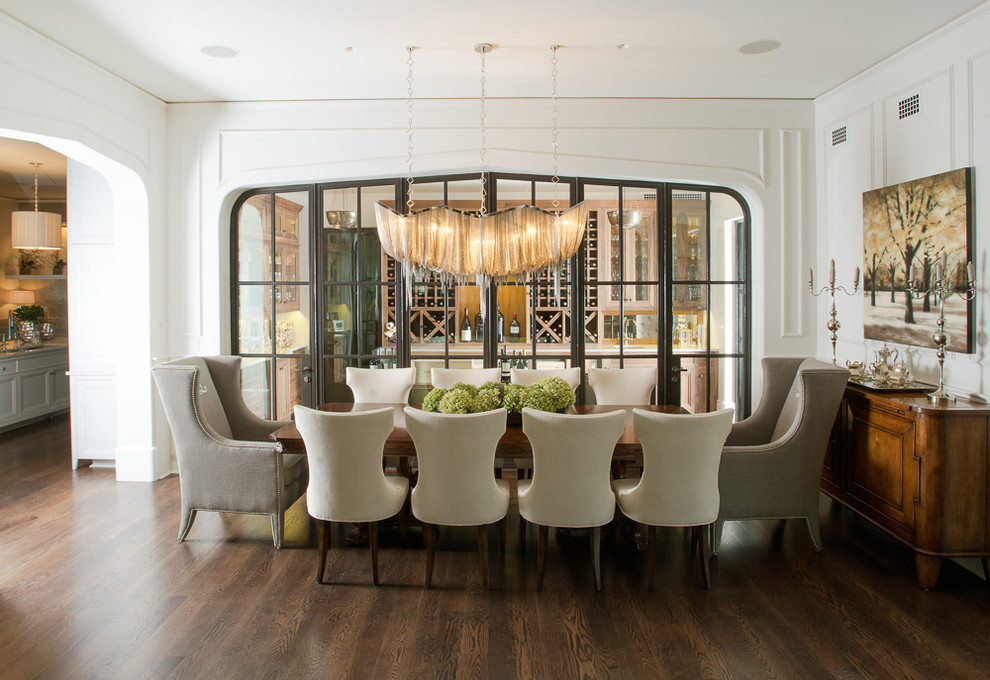 Dining room - huge transitional dark wood floor dining room idea in Chicago with white walls