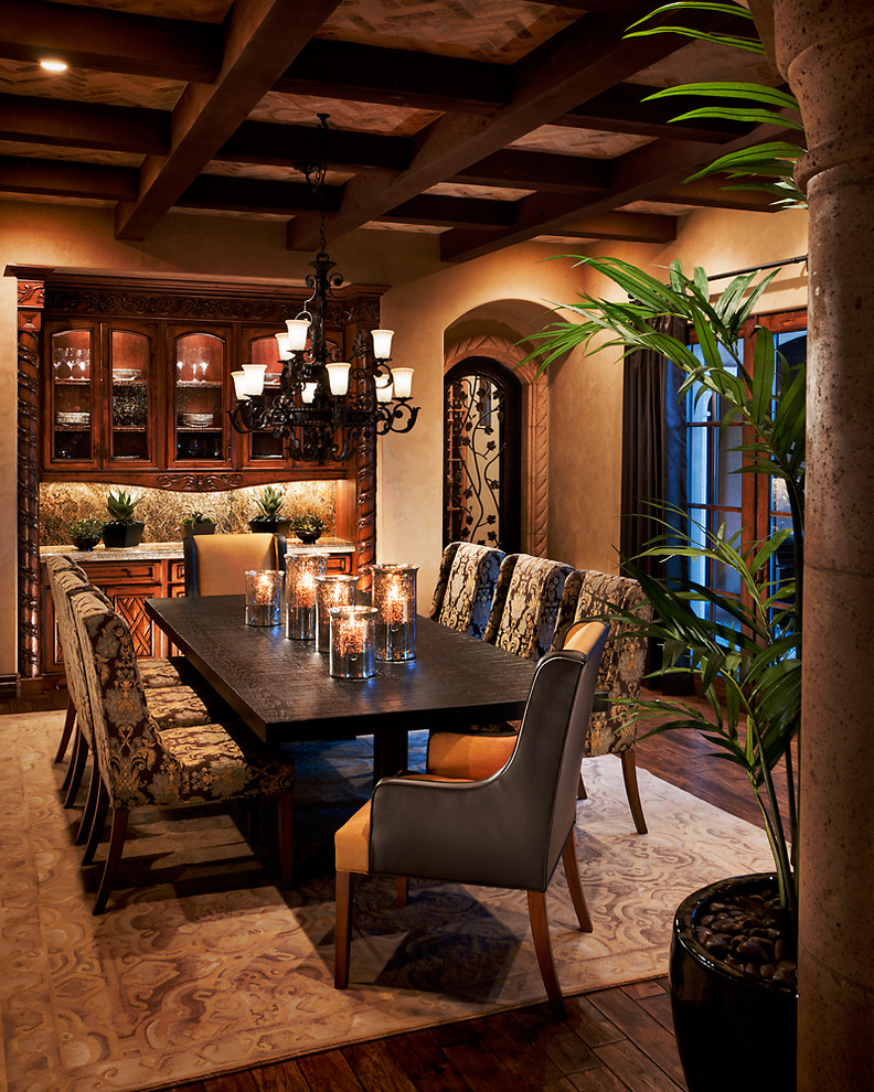 Inspiration for a traditional dining room in Phoenix with dark hardwood flooring.