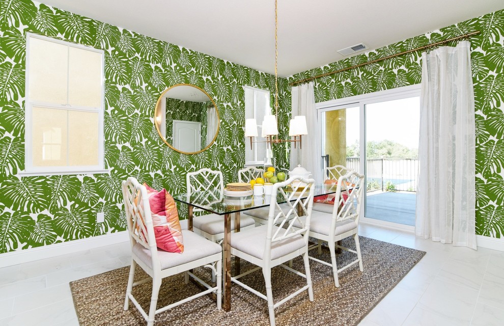 Inspiration for a mid-sized tropical porcelain tile kitchen/dining room combo remodel in Sacramento with green walls