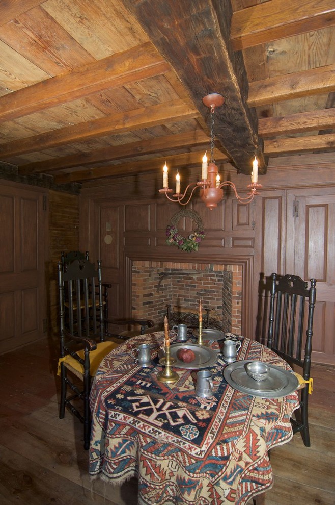This is an example of a rustic dining room in Boston.