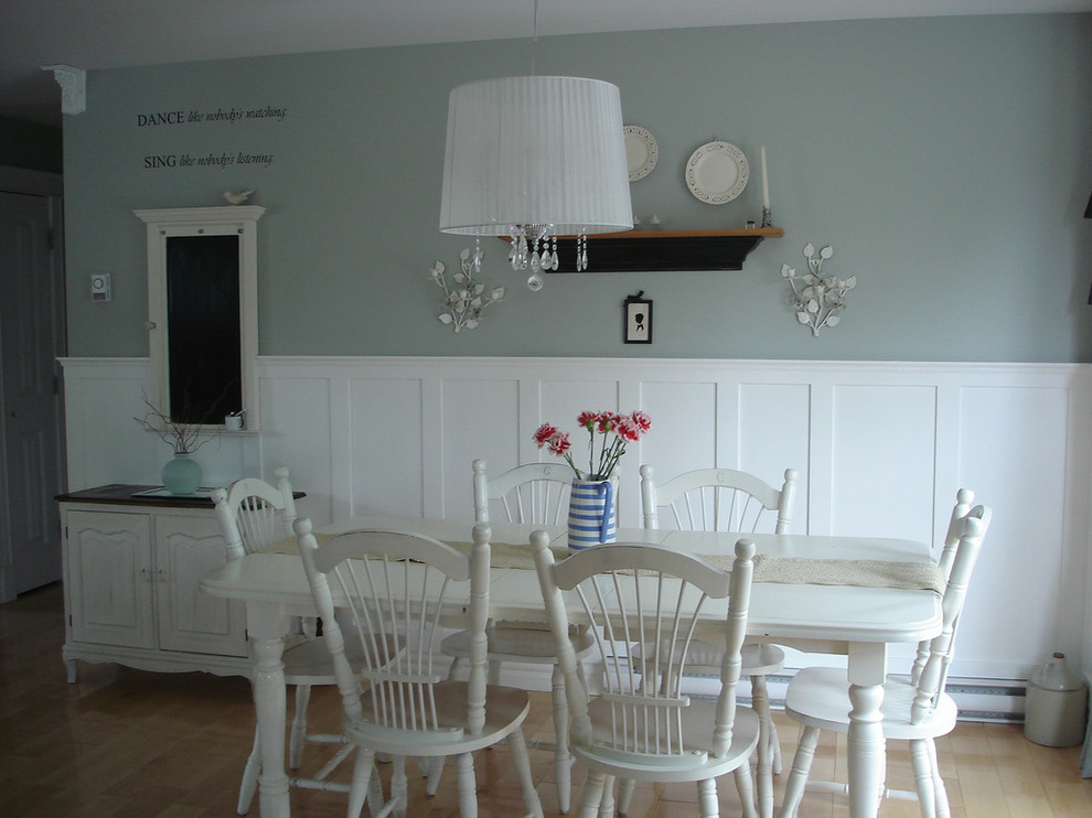 Inspiration for a shabby-chic style dining room in Other with light hardwood flooring and grey walls.