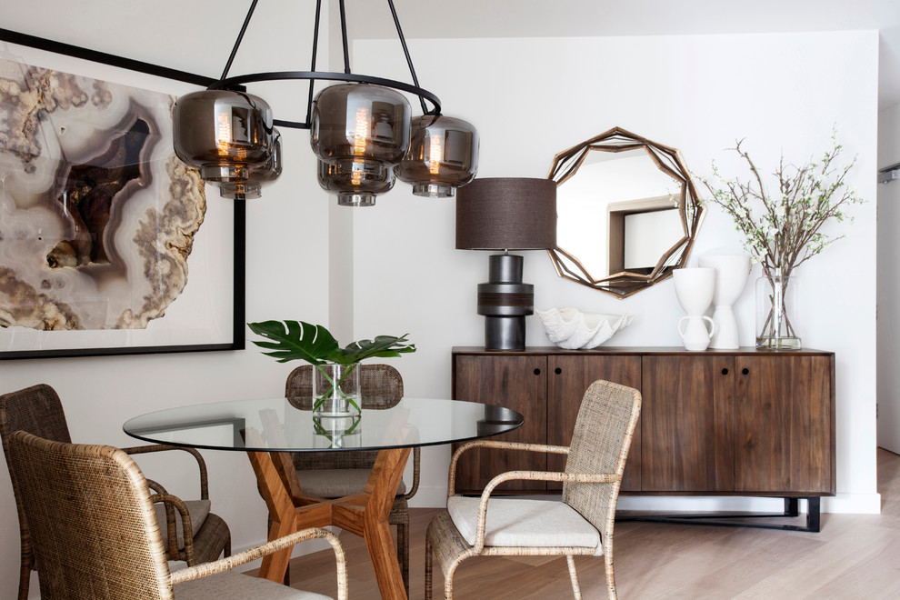 Dining room - contemporary light wood floor dining room idea in Melbourne with white walls