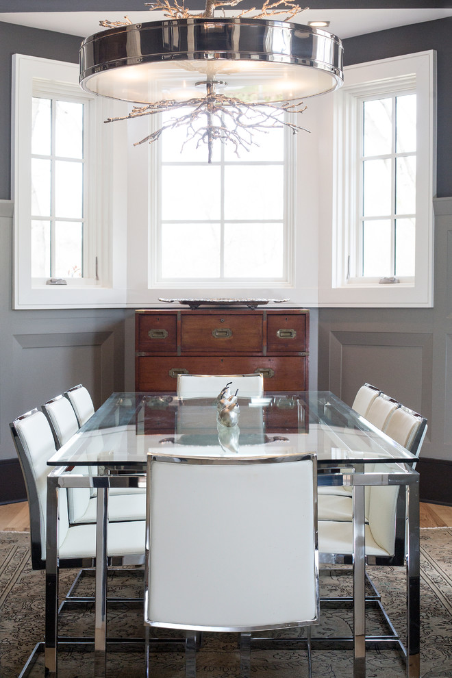 Dining room - transitional medium tone wood floor dining room idea in Charlotte