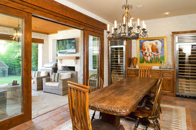 This is an example of an eclectic dining room in Austin.