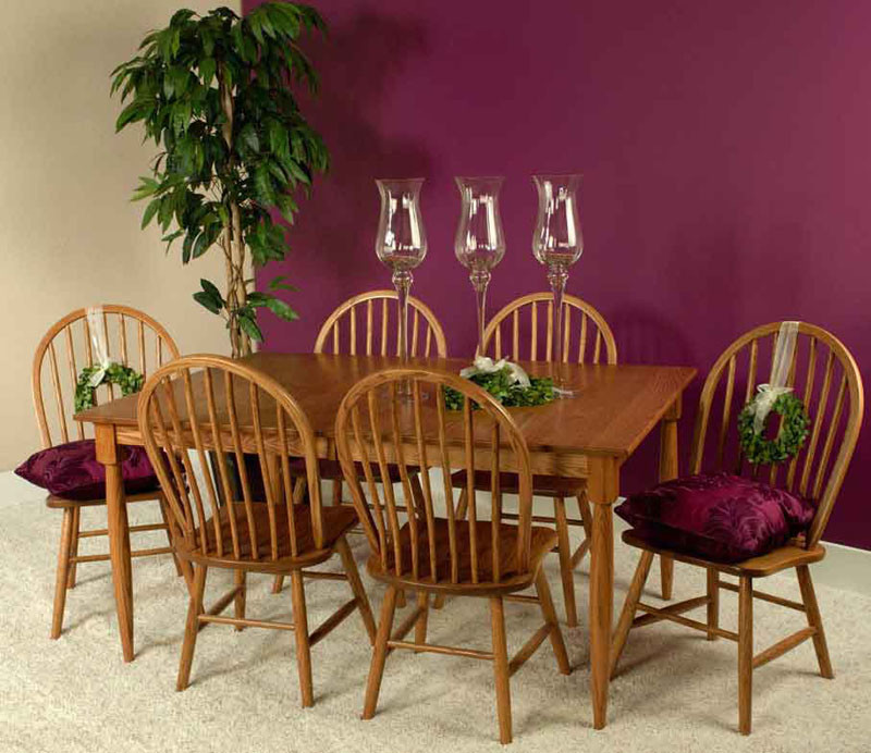 Example of a mid-sized classic carpeted kitchen/dining room combo design in Other with multicolored walls and no fireplace