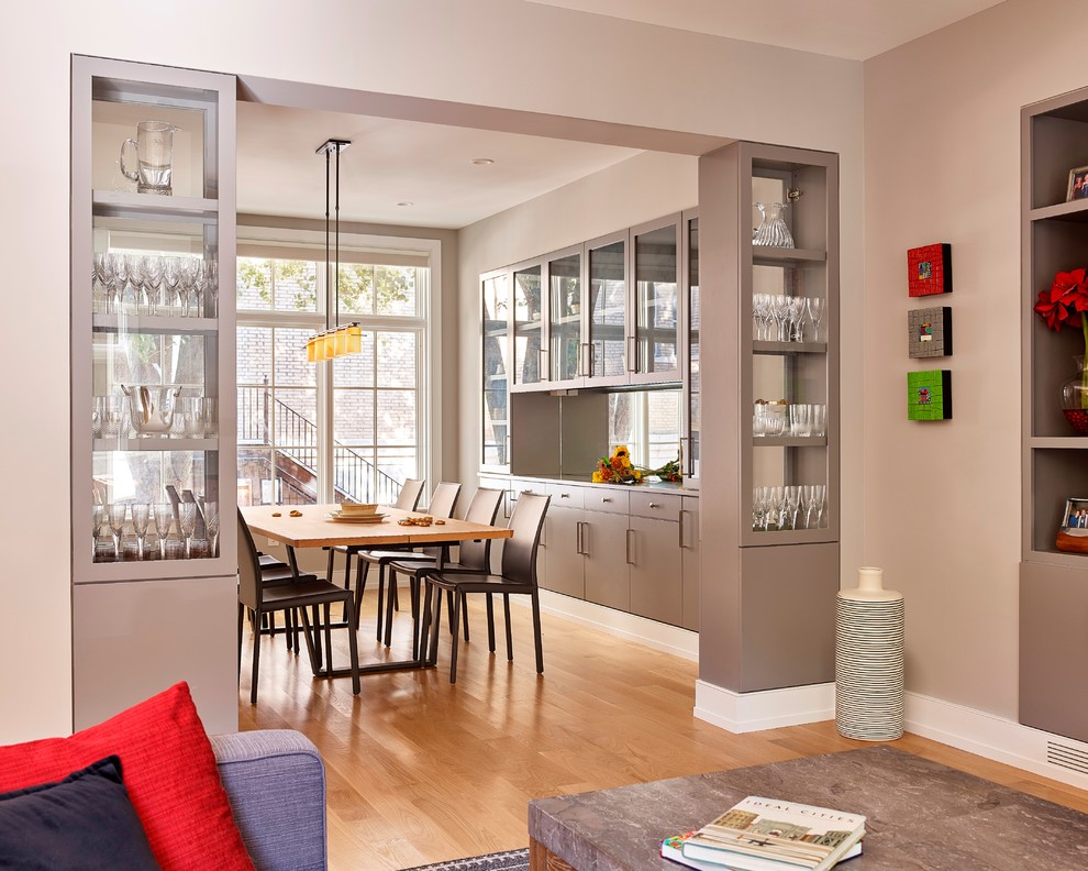Dining room - contemporary medium tone wood floor and brown floor dining room idea in Philadelphia with gray walls