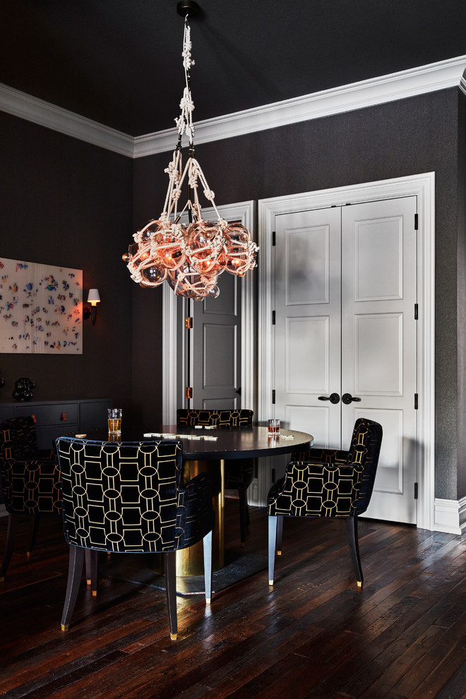 This is an example of a medium sized classic enclosed dining room in Philadelphia with grey walls and dark hardwood flooring.