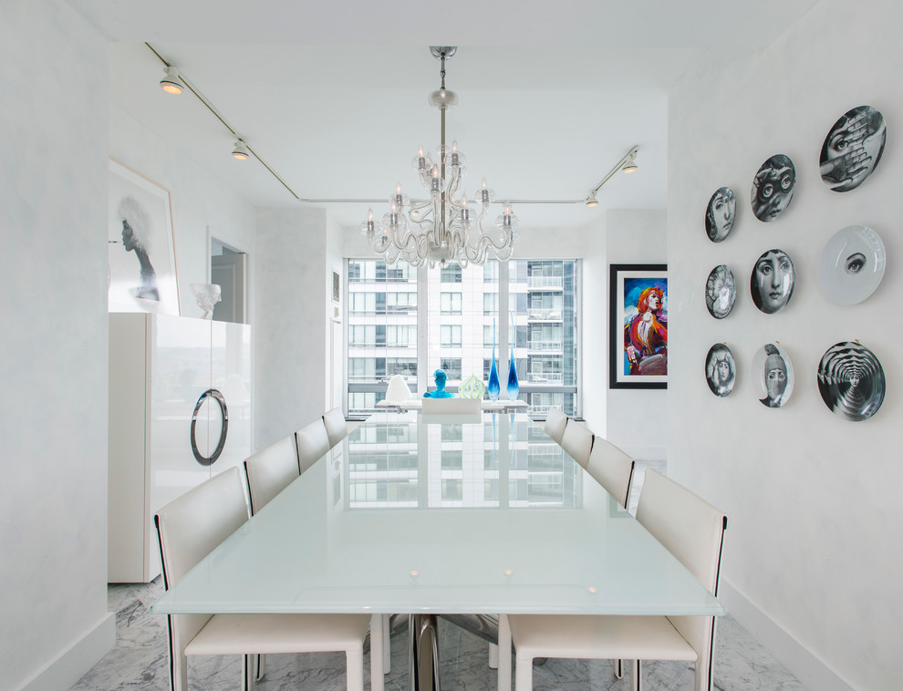 Medium sized contemporary dining room in Boston with white walls and marble flooring.