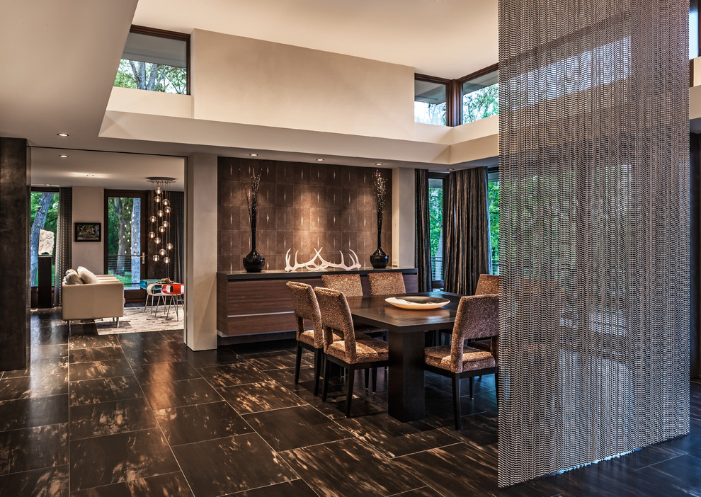 Example of a trendy ceramic tile dining room design in Minneapolis with white walls