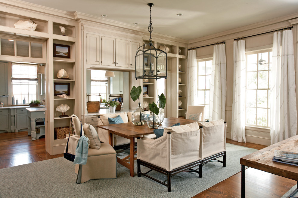 Photo of a rustic dining room in Atlanta with beige walls and dark hardwood flooring.