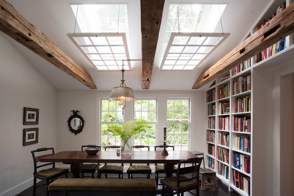 Mountain style dark wood floor dining room photo in Philadelphia with white walls