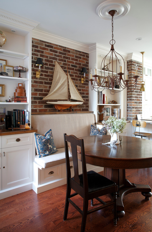Photo of a small rustic kitchen/dining room in Toronto with white walls, dark hardwood flooring and no fireplace.