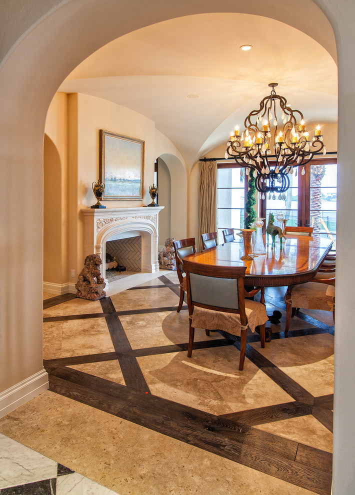 Example of a tuscan dining room design in Miami