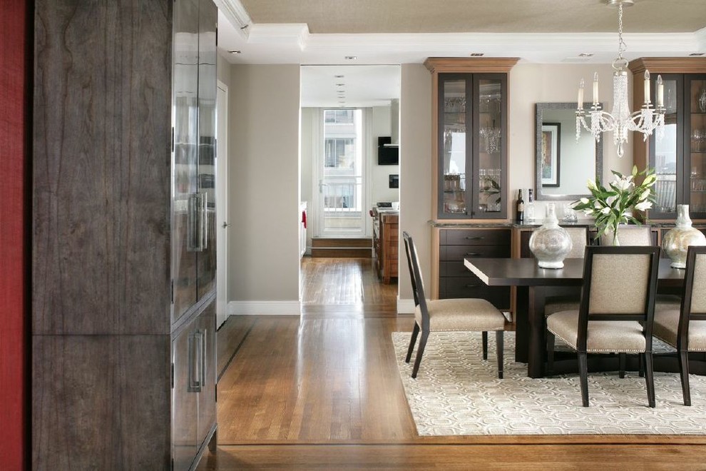 Inspiration for a medium sized contemporary kitchen/dining room in New York with white walls and light hardwood flooring.