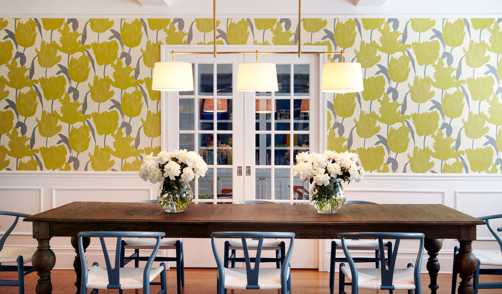 Enclosed dining room - large contemporary medium tone wood floor enclosed dining room idea in New York with multicolored walls and no fireplace