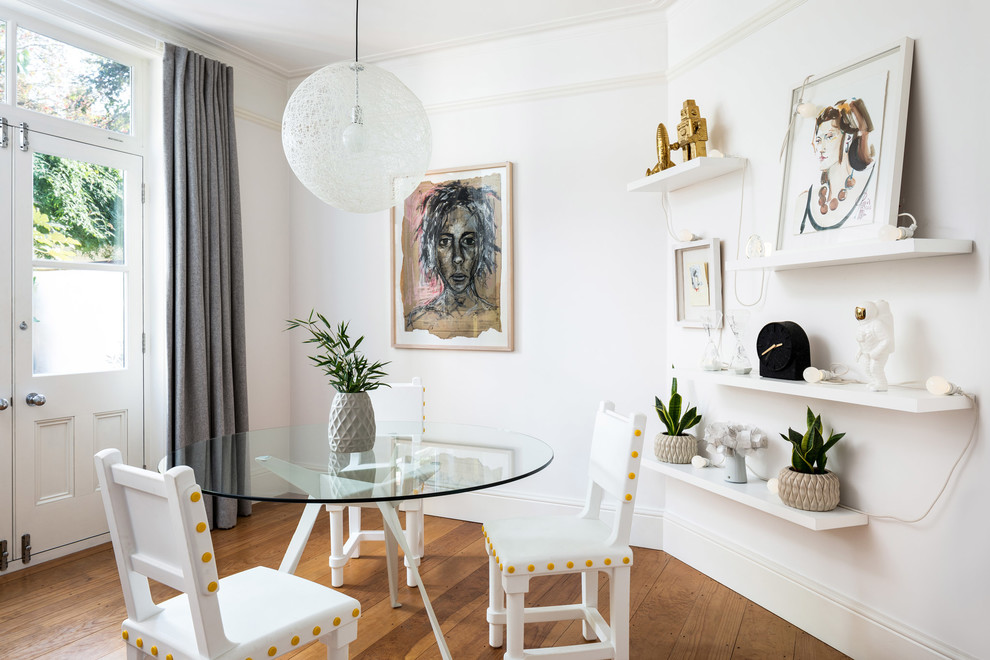 Inspiration for a scandi dining room in Other with white walls, medium hardwood flooring and brown floors.
