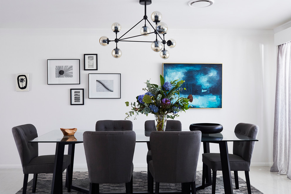 Mid-sized trendy dining room photo in Brisbane with white walls