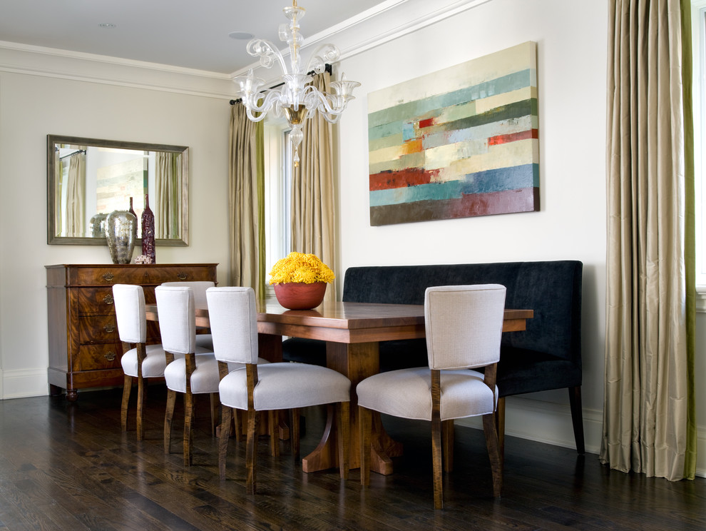 Design ideas for a contemporary dining room in Toronto with white walls, dark hardwood flooring and feature lighting.