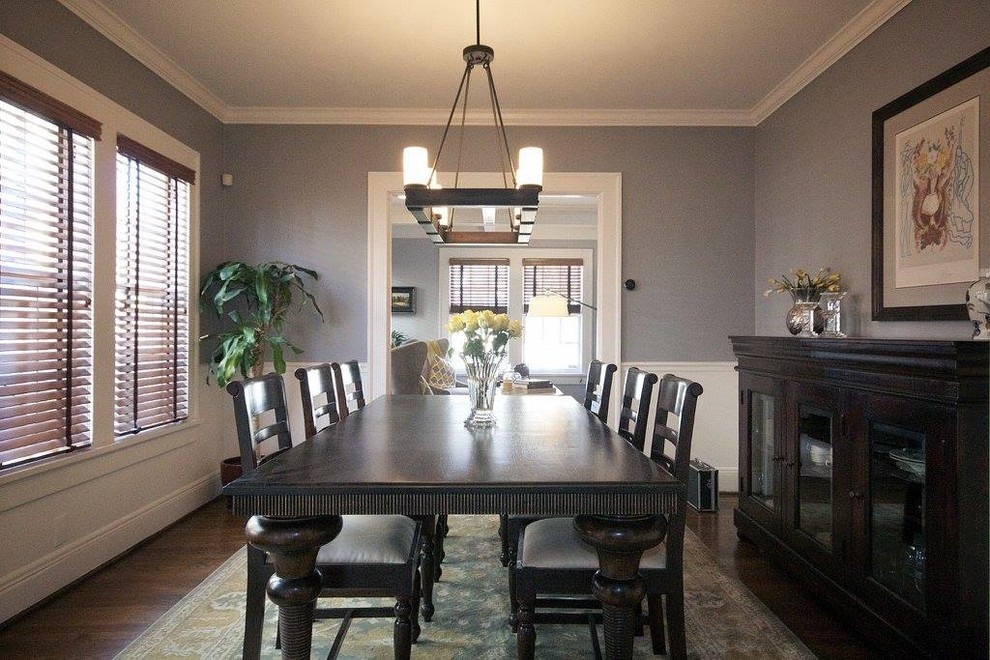This is an example of a large traditional enclosed dining room in Atlanta with dark hardwood flooring and grey walls.
