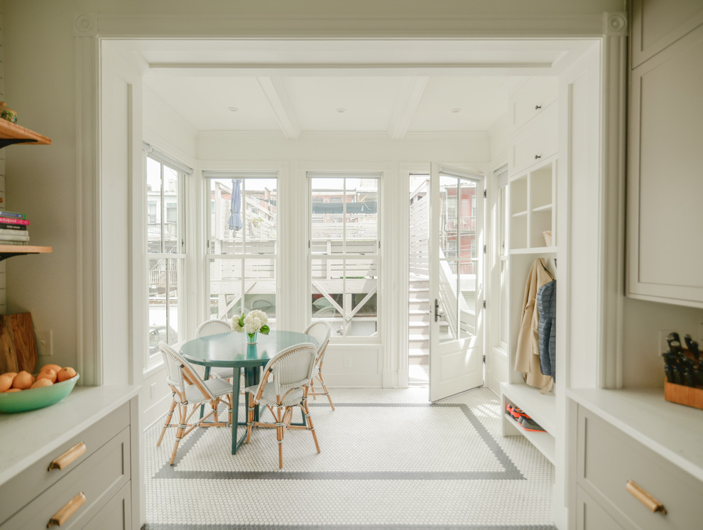 Inspiration for a mid-sized timeless porcelain tile and white floor kitchen/dining room combo remodel in DC Metro with white walls and no fireplace