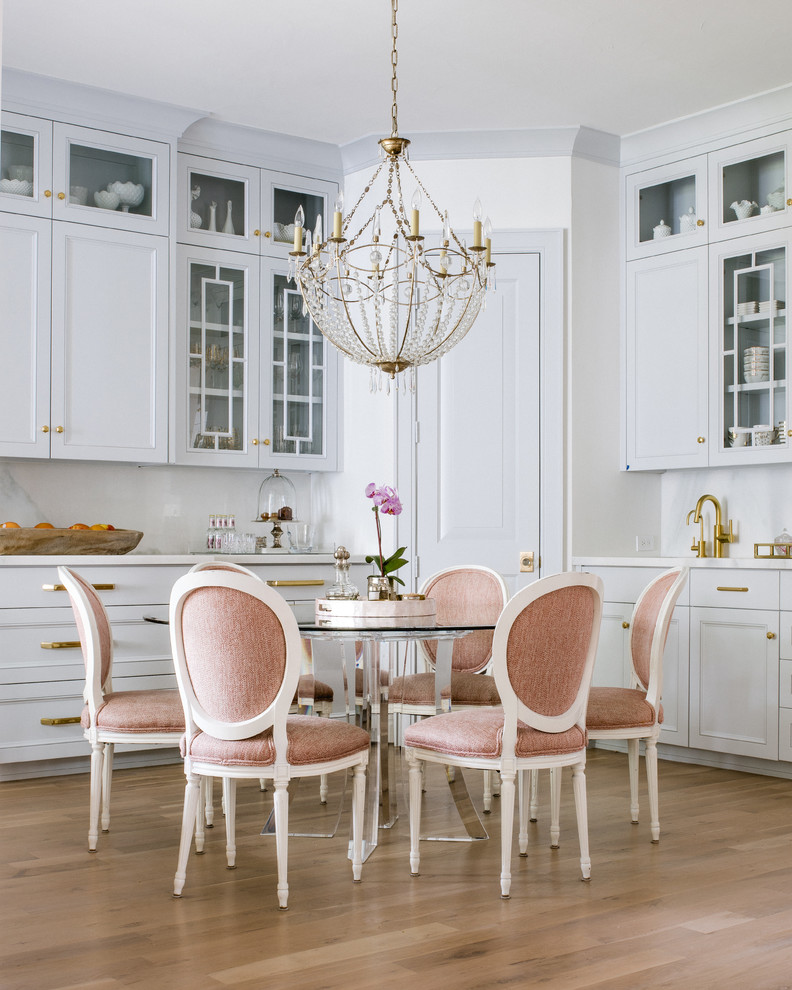 Elegant light wood floor dining room photo in Dallas with white walls