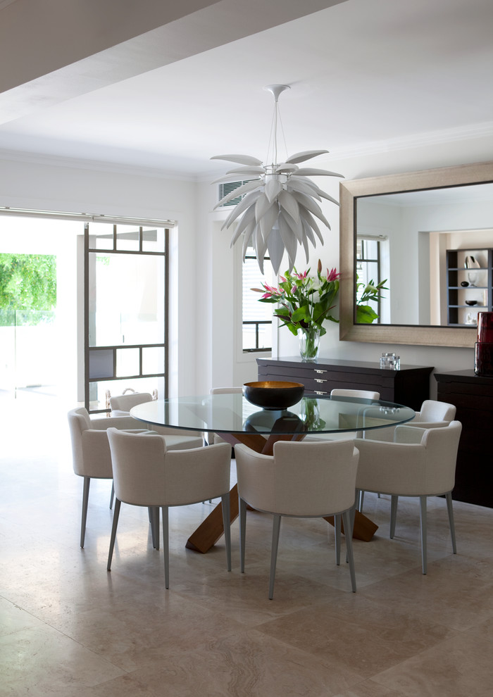 This is an example of a medium sized contemporary dining room in Sydney with white walls.
