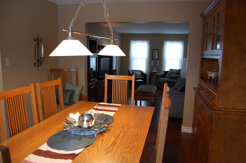 Example of an eclectic dining room design in Toronto