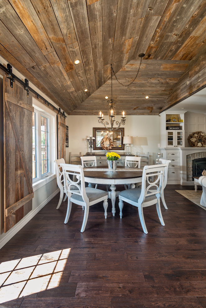 Great room - french country medium tone wood floor great room idea in Toronto with gray walls