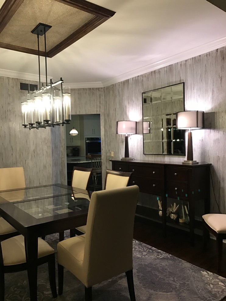 Inspiration for a large contemporary dark wood floor and gray floor enclosed dining room remodel in Detroit with gray walls and no fireplace