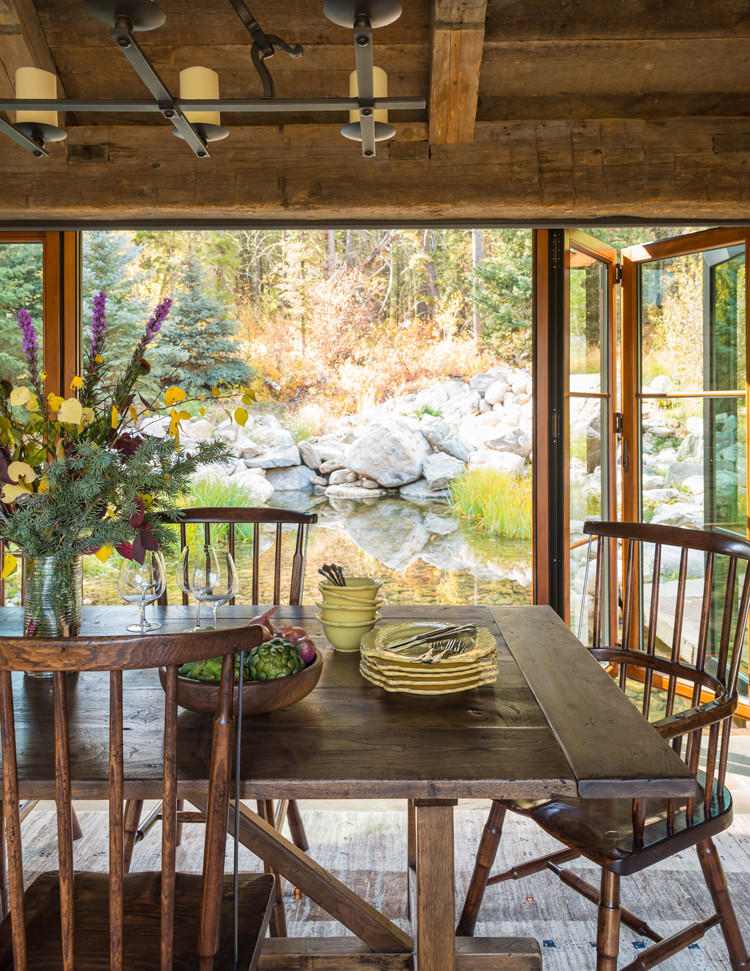 Photo of a rustic dining room in Denver.