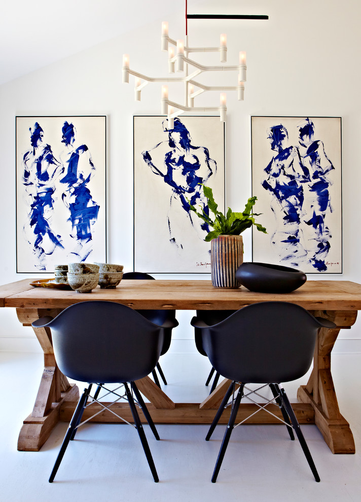 Inspiration for a medium sized modern enclosed dining room in New York with white walls, lino flooring and no fireplace.