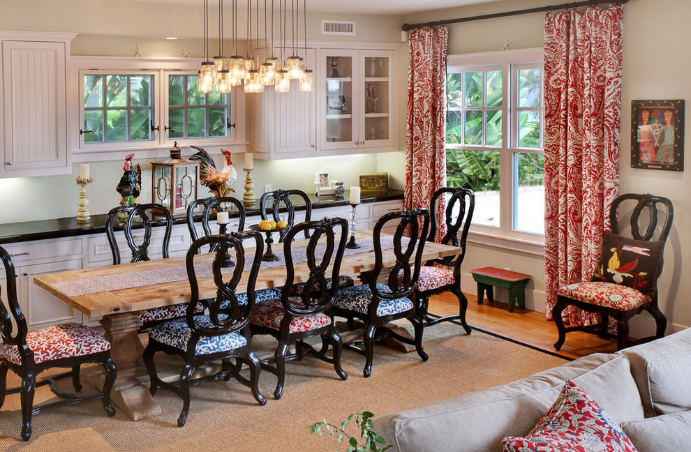 Inspiration for a country kitchen/dining room in Orange County with beige walls and medium hardwood flooring.