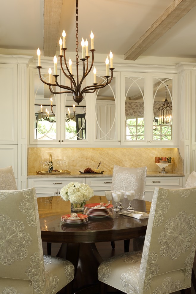 Classic open plan dining room in Los Angeles with beige walls.
