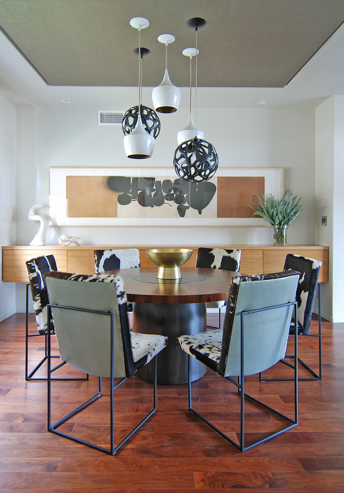 Dining room - contemporary dark wood floor dining room idea in Los Angeles with white walls