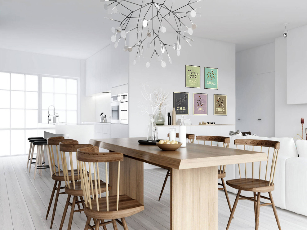 Large scandi dining room in Esbjerg with white walls and white floors.