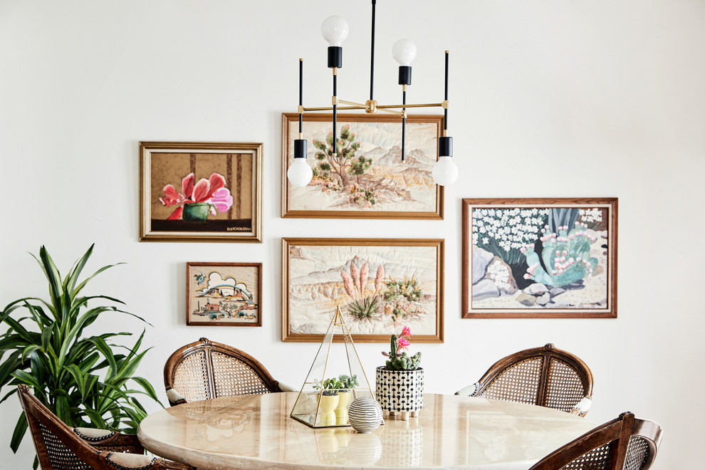 Inspiration for a dining room in Sacramento with white walls.