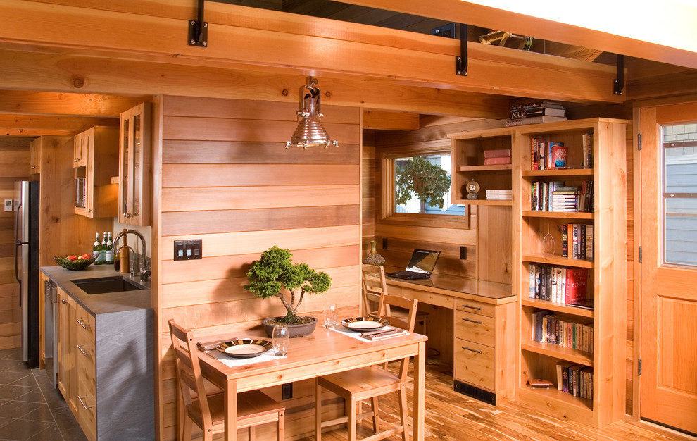 Small mountain style medium tone wood floor kitchen/dining room combo photo in Seattle