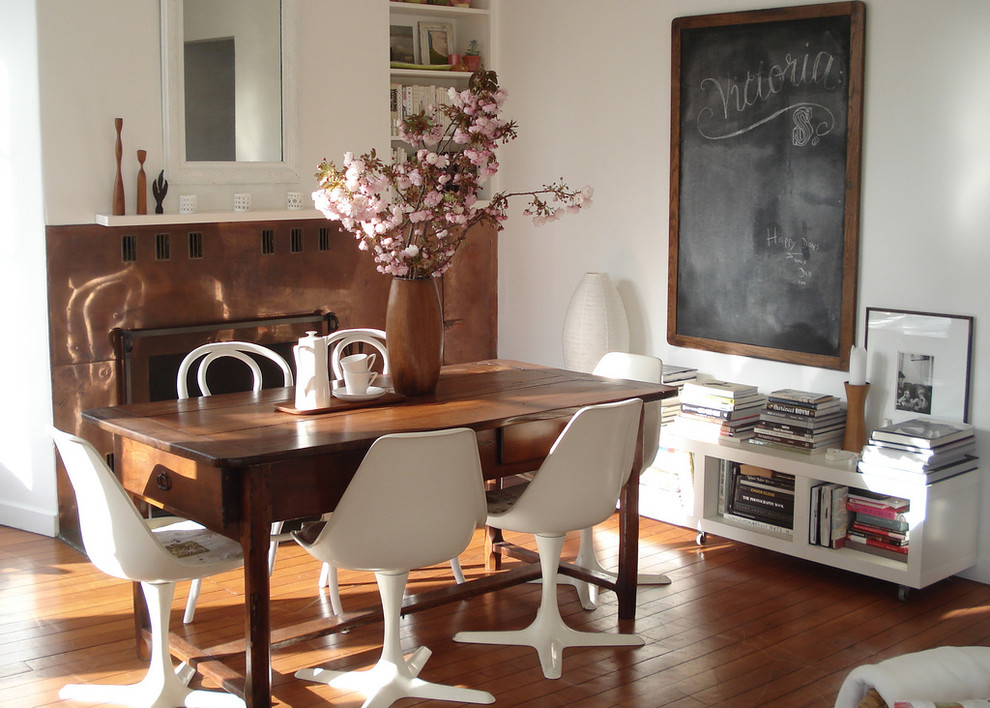 Dining room - shabby-chic style dark wood floor dining room idea in San Francisco with white walls