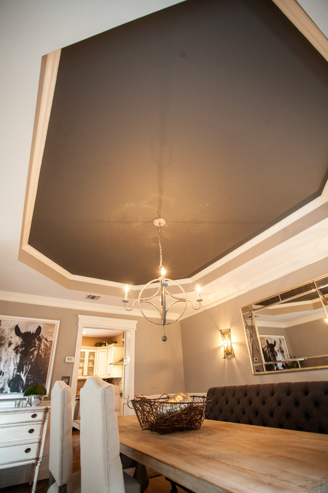 Dining room - transitional dark wood floor dining room idea in New York with gray walls