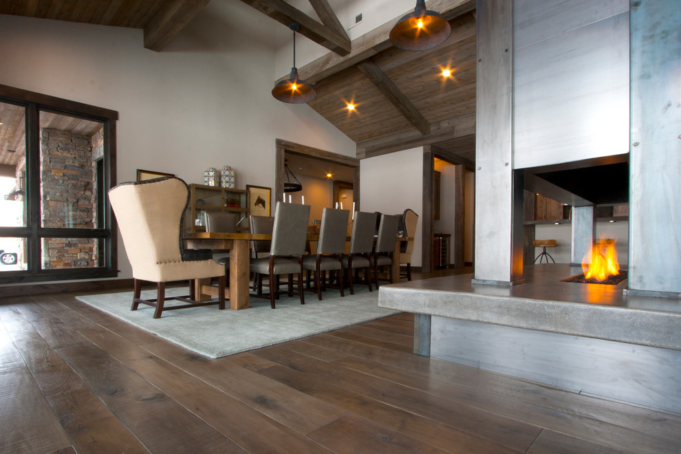 Great room - huge contemporary light wood floor great room idea in Salt Lake City with white walls, a two-sided fireplace and a metal fireplace