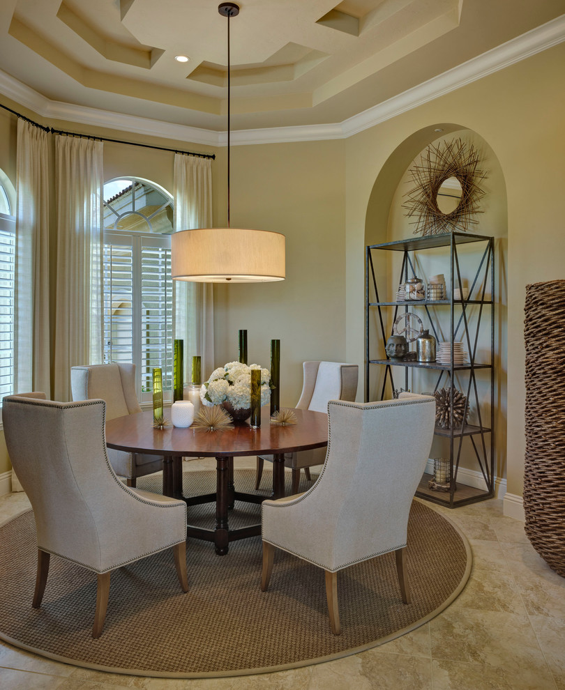 Inspiration for a traditional dining room in Miami with beige walls.
