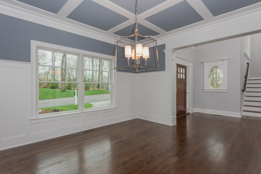 This is an example of a medium sized classic enclosed dining room in Bridgeport with grey walls, dark hardwood flooring, brown floors and no fireplace.