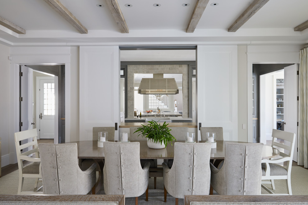 Inspiration for a coastal dining room remodel in New York with beige walls and no fireplace