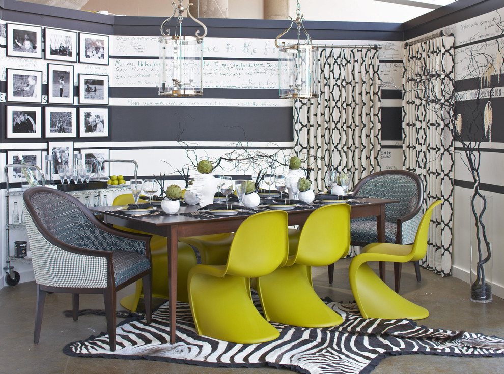 Idée de décoration pour une salle à manger bohème avec sol en béton ciré.