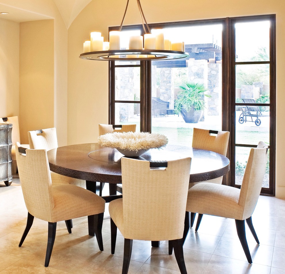 Inspiration for a traditional open plan dining room in Phoenix with beige walls and ceramic flooring.
