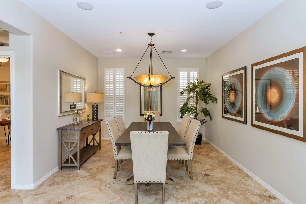 Elegant beige floor enclosed dining room photo in Phoenix with gray walls