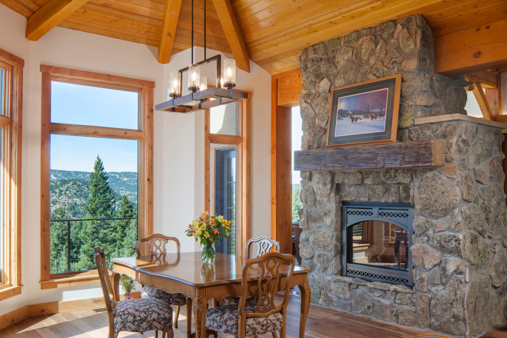 Mountain style dining room photo in Denver