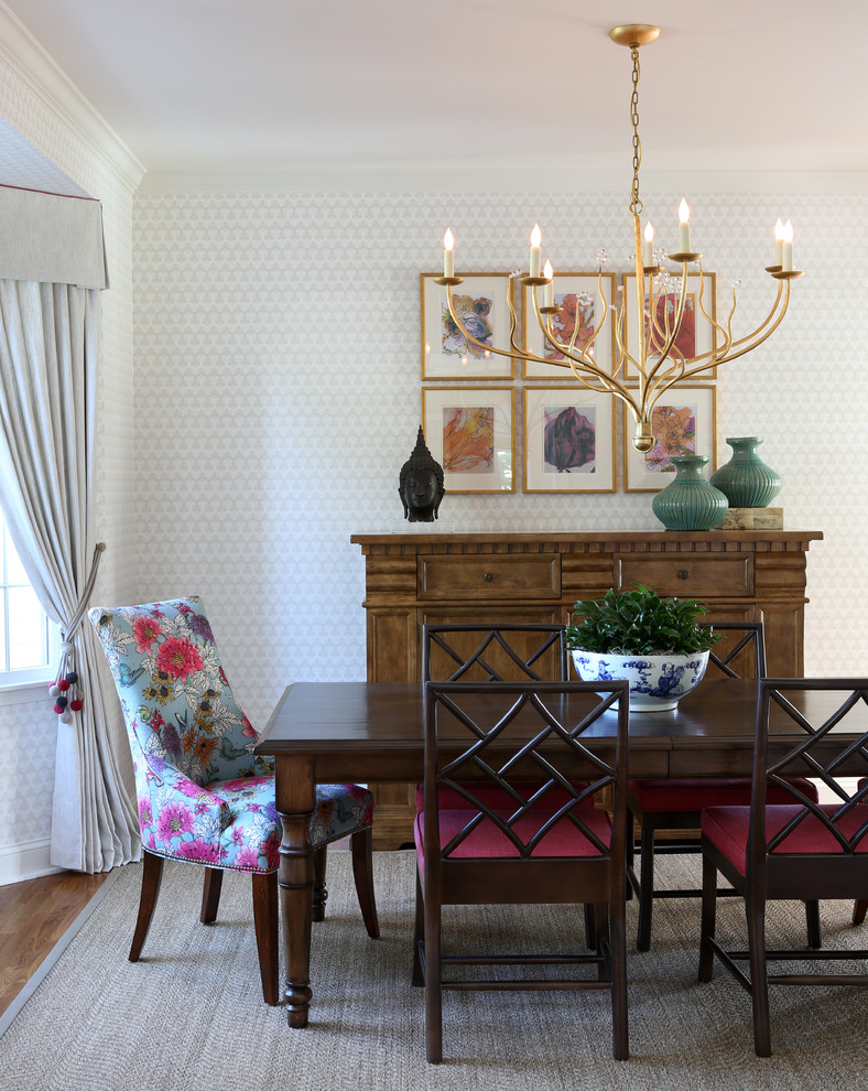 Mid-sized elegant medium tone wood floor and beige floor enclosed dining room photo in New York with beige walls