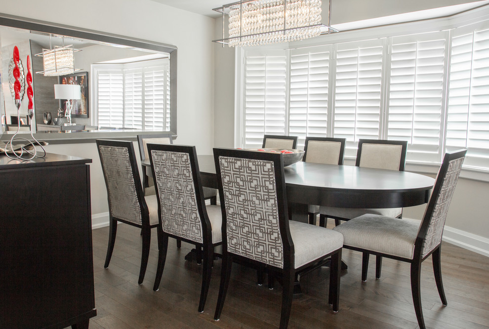 Inspiration for a large contemporary dining room in Toronto with grey walls and medium hardwood flooring.